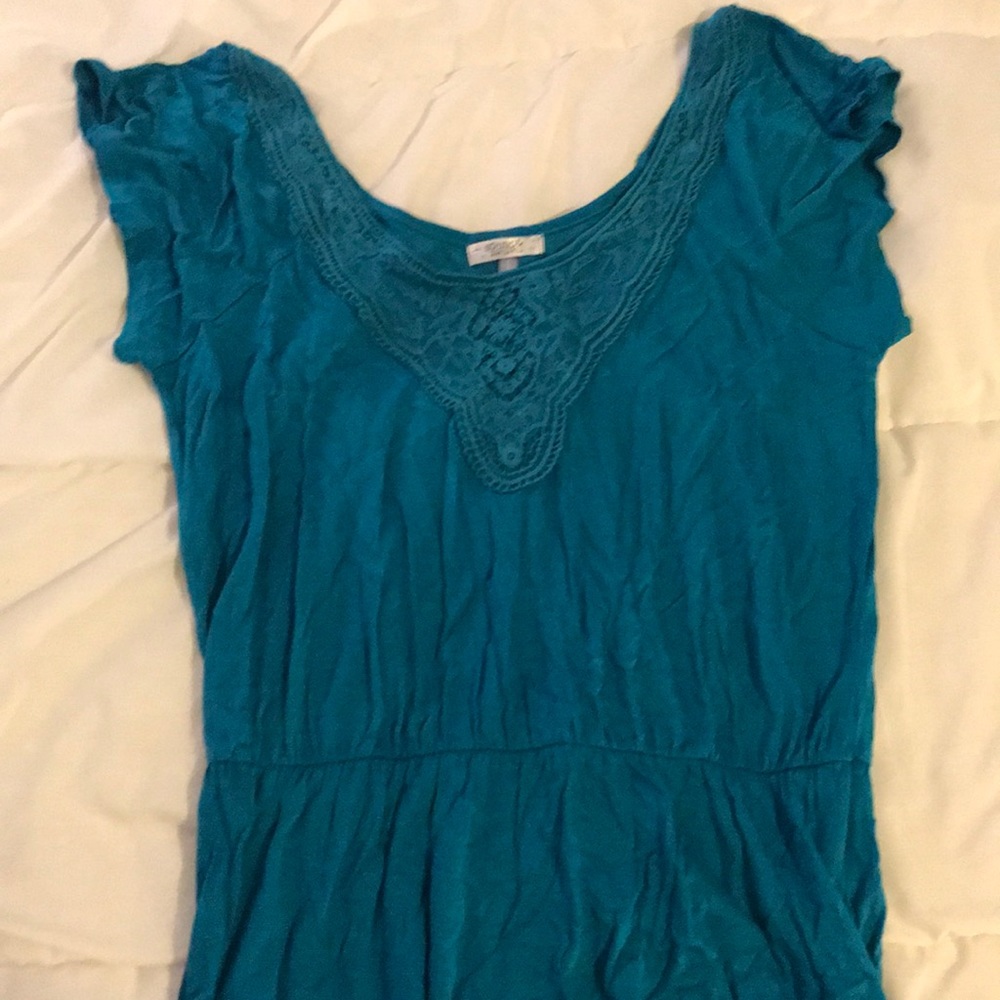 Blue shirt.